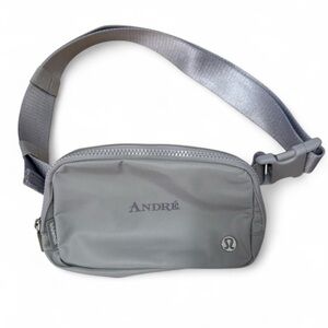 LULULEMON everywhere belt bag with personalized André on the front. NWOT.